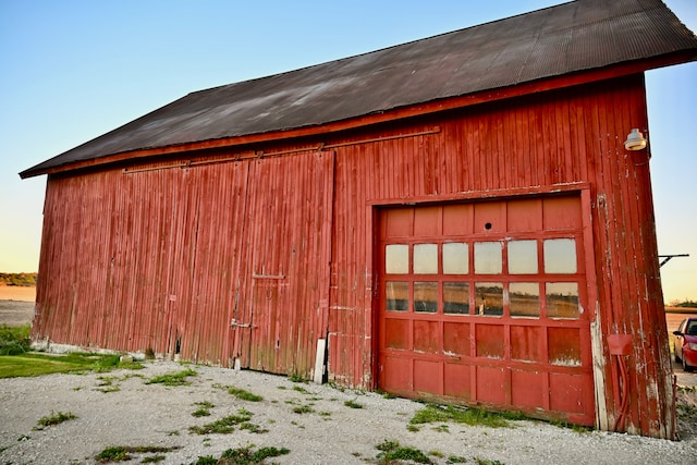 12101 Todd Rd, Ida, MI 48140 - garage at dusk with a detached garage