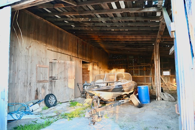 12101 Todd Rd, Ida, MI 48140 - miscellaneous room featuring wooden walls and lofted ceiling