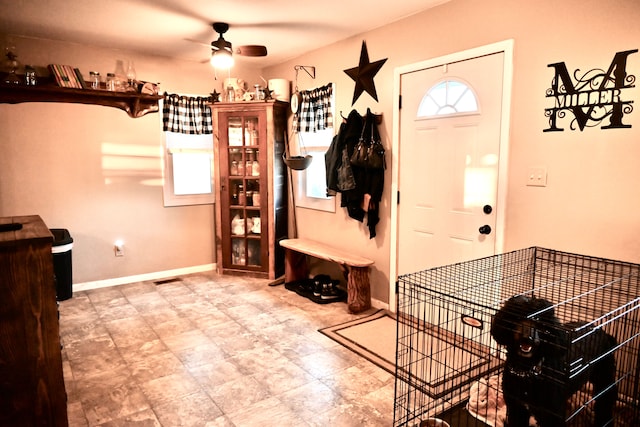 12101 Todd Rd, Ida, MI 48140 - mudroom featuring a ceiling fan and baseboards