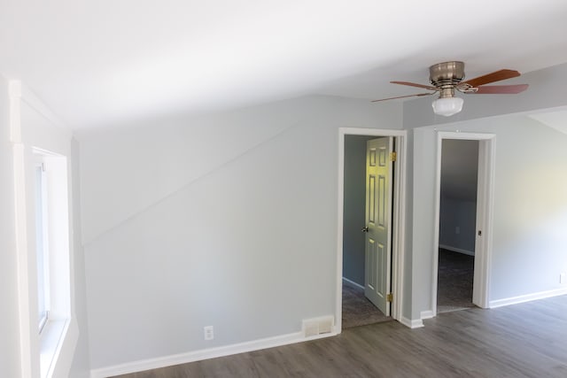 empty room with hardwood / wood-style floors and ceiling fan