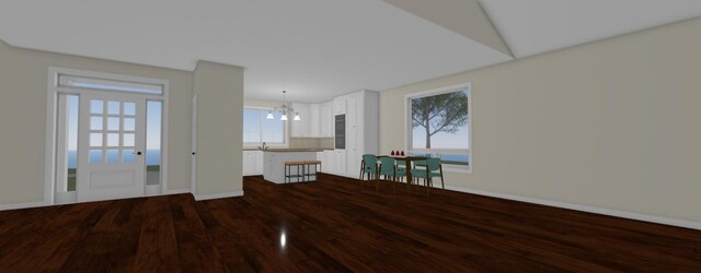 6336 Mast Rd, Dexter, MI 48130 - unfurnished living room featuring dark wood-type flooring, a chandelier, and baseboards