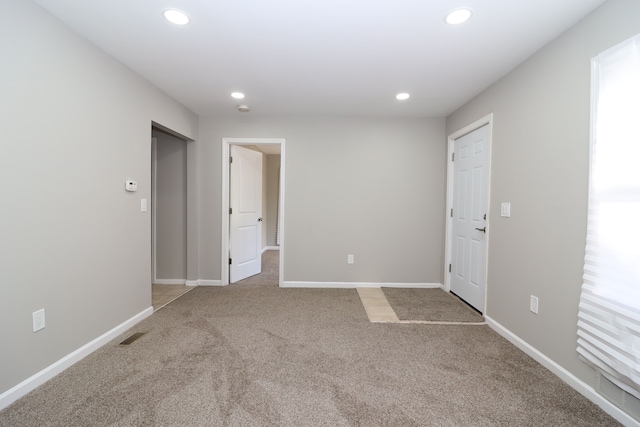 view of carpeted spare room