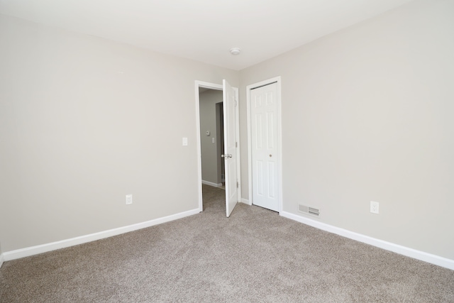 empty room with carpet floors