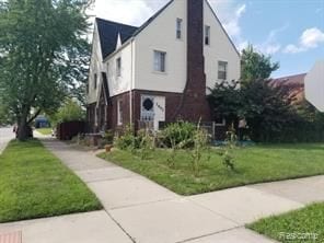 7603 Kentucky St, Dearborn, MI 48126 - view of home's exterior with a yard