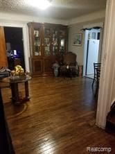 7603 Kentucky St, Dearborn, MI 48126 - living area with dark wood-style floors