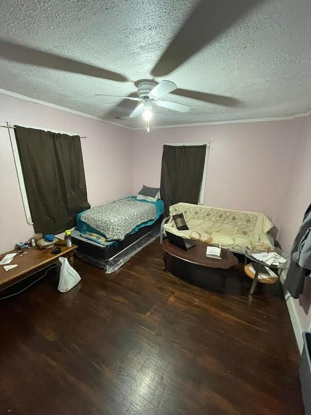 7603 Kentucky St, Dearborn, MI 48126 - bedroom with wood finished floors, a textured ceiling, a ceiling fan, and ornamental molding