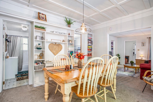 view of carpeted dining area