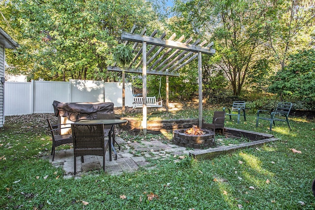 view of yard with a pergola, a patio area, and a fire pit