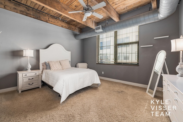 bedroom with carpet flooring, beam ceiling, ceiling fan, and wooden ceiling