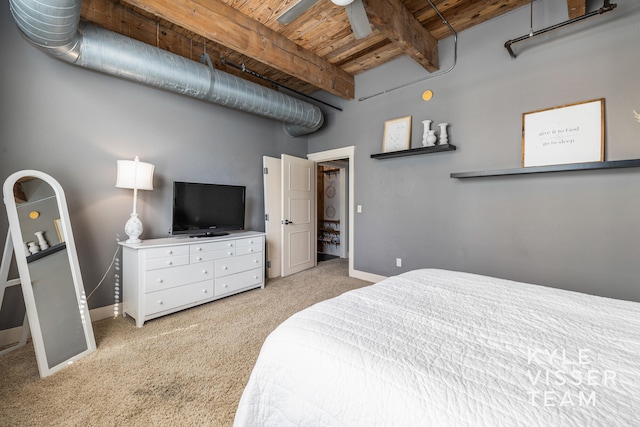 carpeted bedroom featuring beamed ceiling, ceiling fan, and wooden ceiling