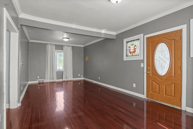 entryway with hardwood / wood-style flooring and crown molding