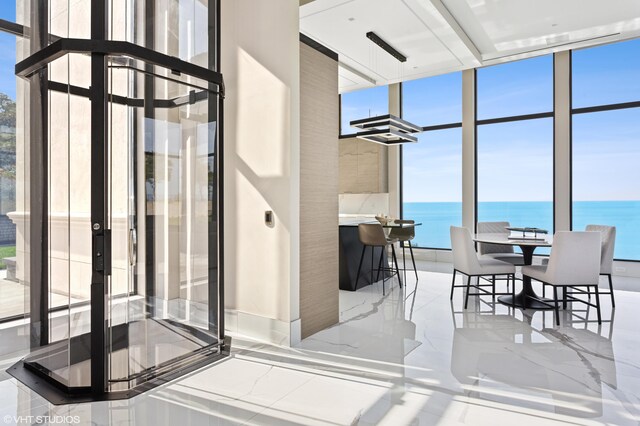 639 Sul Lago Ave S, Benton Harbor, MI 49022 - sunroom featuring a water view and healthy amount of natural light