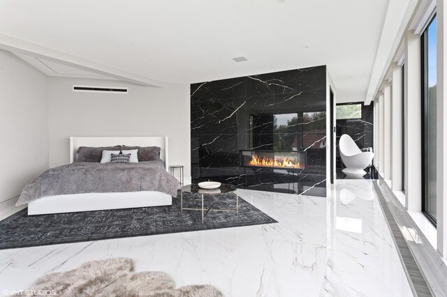 639 Sul Lago Ave S, Benton Harbor, MI 49022 - bedroom with marble tiled flooring and a premium fireplace