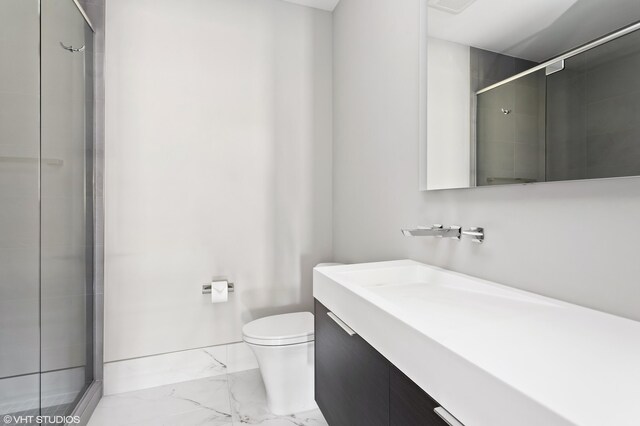 639 Sul Lago Ave S, Benton Harbor, MI 49022 - full bathroom with marble look tiles, vanity, a stall shower, and toilet