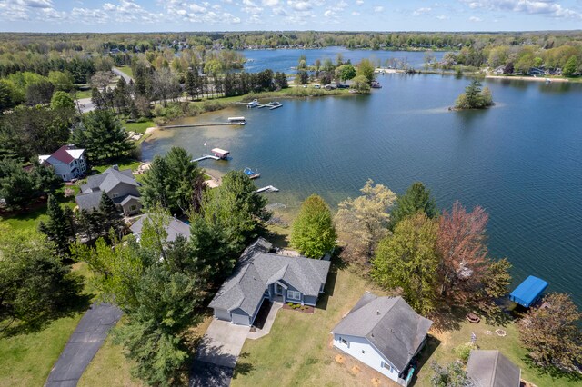 bird's eye view with a water view