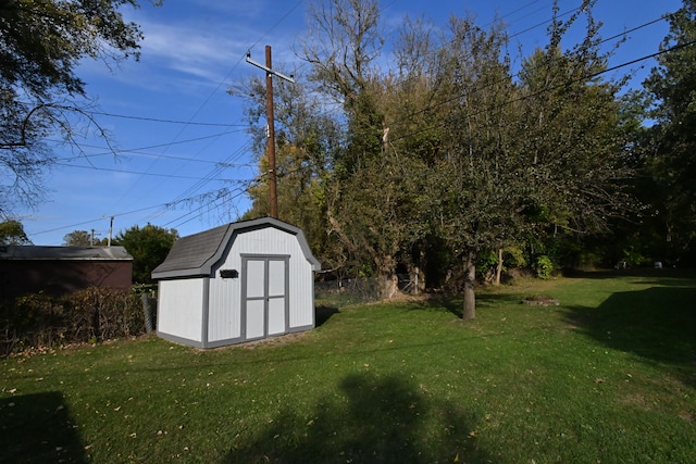 view of outdoor structure with a yard