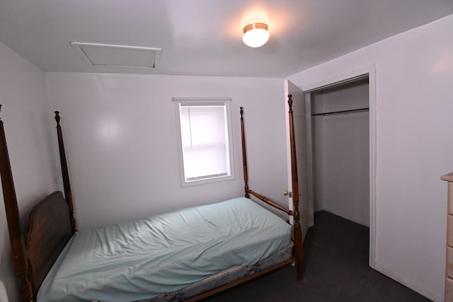 carpeted bedroom with a closet