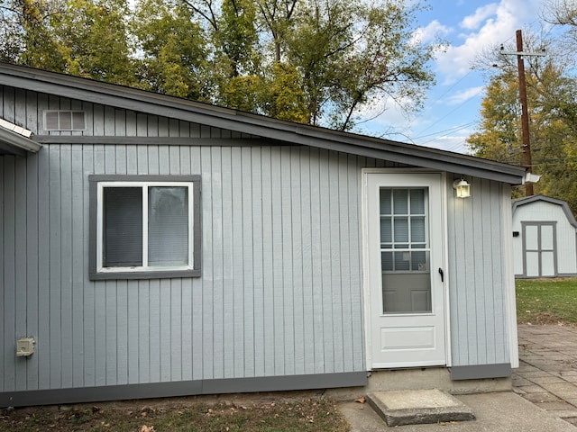 exterior space with a storage shed