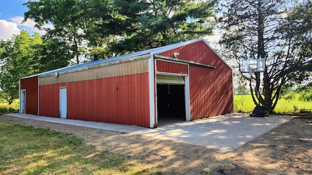 view of outbuilding featuring a garage