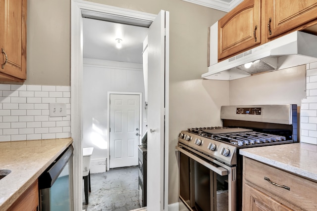 kitchen featuring crown molding, light stone countertops, backsplash, and appliances with stainless steel finishes