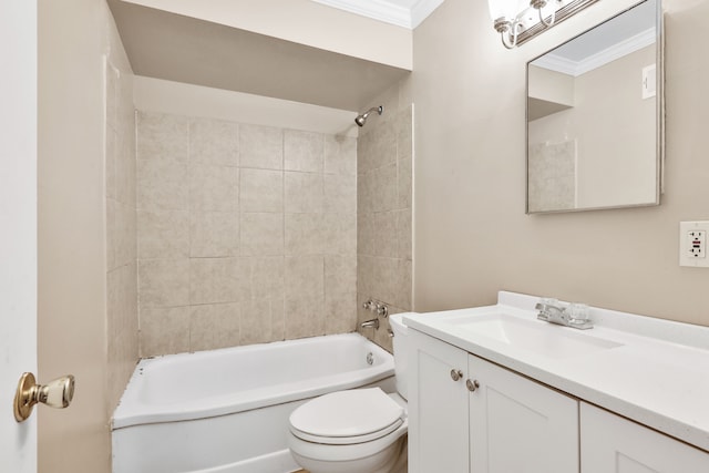 full bathroom with tiled shower / bath, crown molding, vanity, and toilet