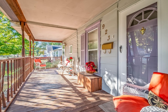 deck with covered porch