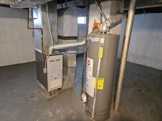 utility room featuring gas water heater