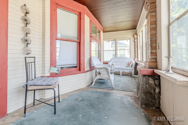 sunroom / solarium with wooden ceiling