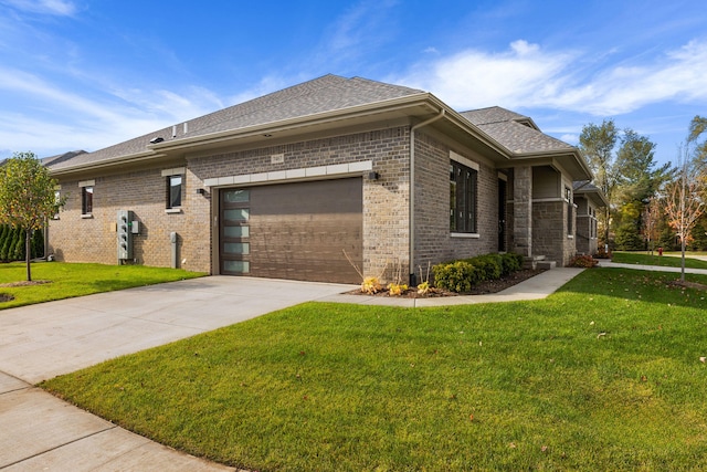 view of side of home with a yard and a garage