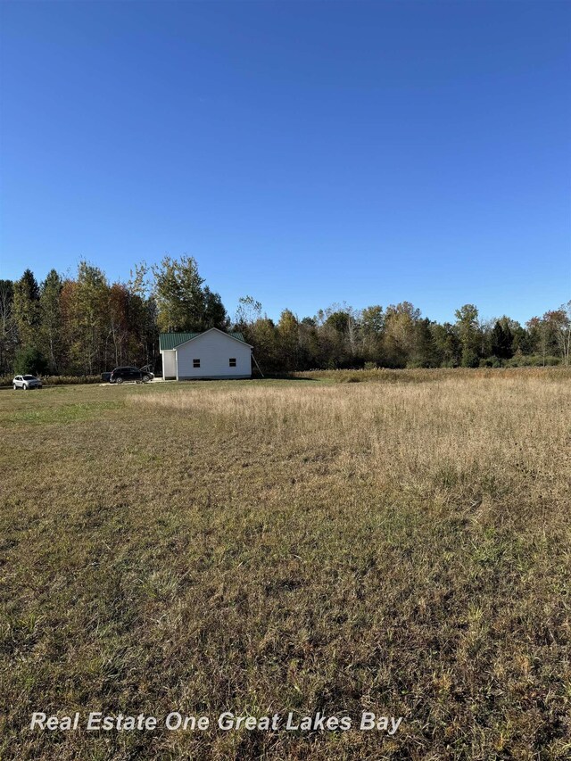 7585 S Steel Rd, Saint Charles, MI 48655 - view of yard featuring a rural view