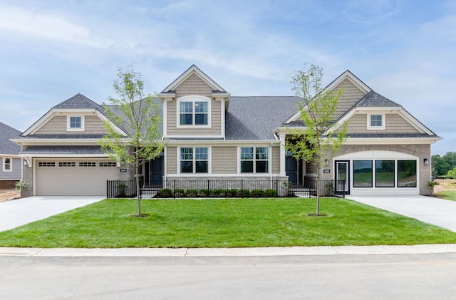 craftsman house featuring a front yard