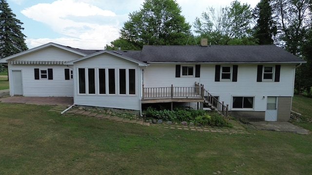 4085 N Cedar Lake Rd, Edmore, MI 48829 - rear view of property featuring a lawn, a chimney, a wooden deck, and stairway