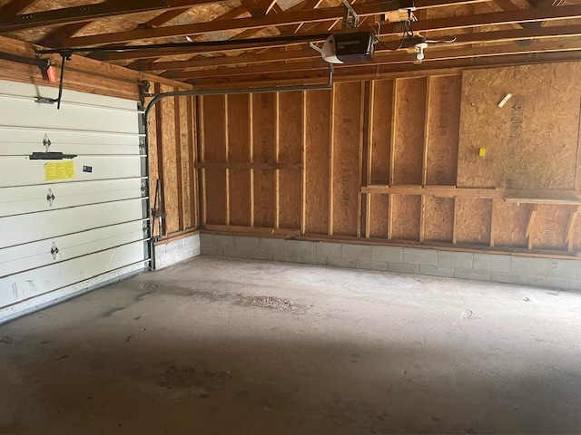 garage featuring a garage door opener