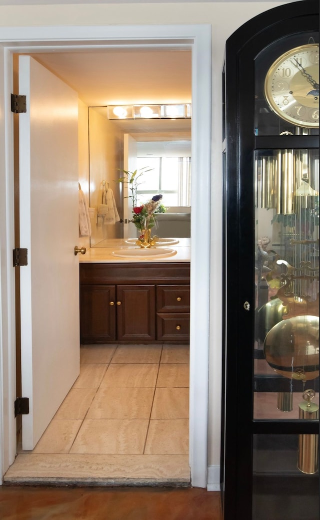 bathroom featuring tile patterned floors and vanity