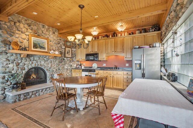 kitchen featuring pendant lighting, black microwave, wooden ceiling, and stainless steel fridge with ice dispenser