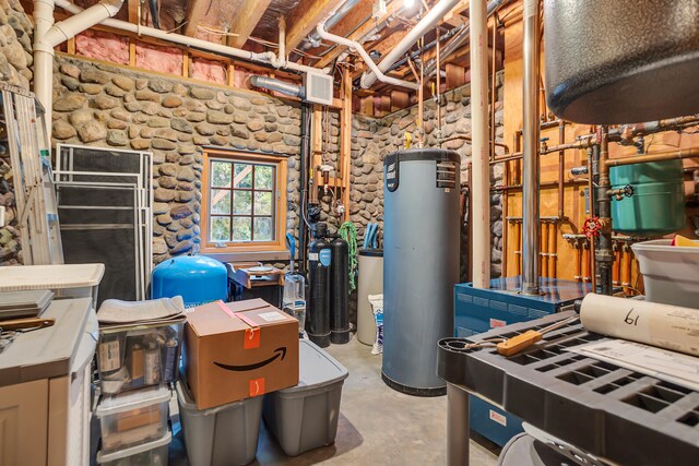 interior space featuring gas water heater and visible vents