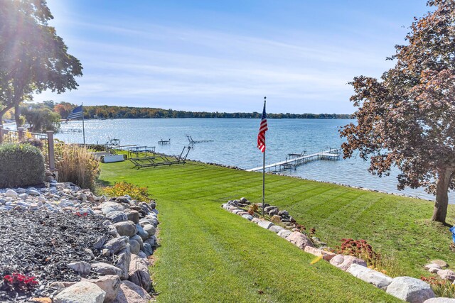 view of water feature with a boat dock