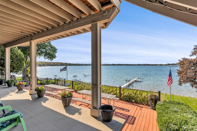 view of patio with a water view