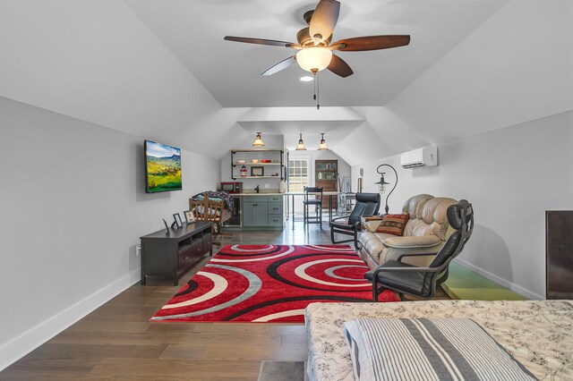 interior space featuring baseboards, a ceiling fan, dark wood-style floors, vaulted ceiling, and an AC wall unit