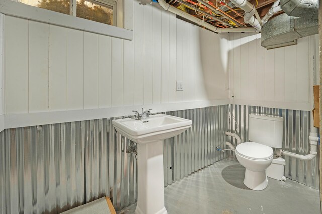 21598 Sylvan Rd, Reed City, MI 49677 - half bath featuring toilet and concrete flooring