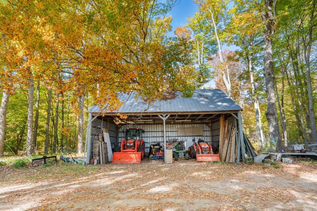 21598 Sylvan Rd, Reed City, MI 49677 - view of pole building featuring a carport
