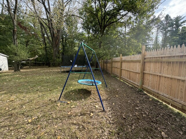 13067 Red Arrow Hwy, Sawyer, MI 49125 - view of play area featuring a trampoline