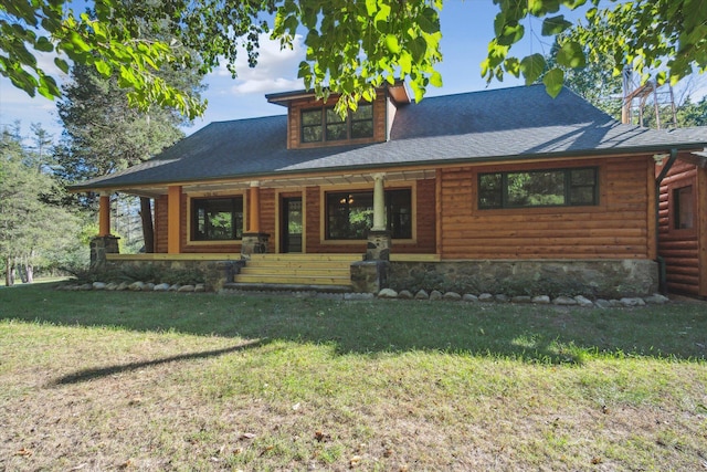 view of front of house with a front yard and covered porch