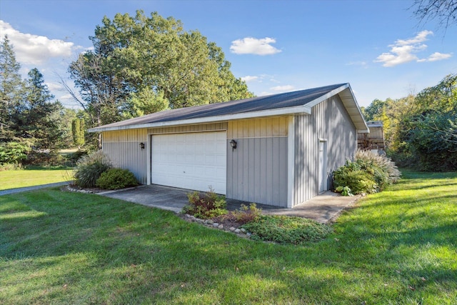 garage with a yard