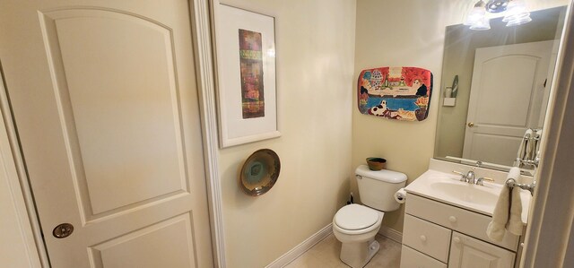 5578 Lake Shore Dr, Weidman, MI 48893 - half bath with vanity, toilet, baseboards, and tile patterned flooring
