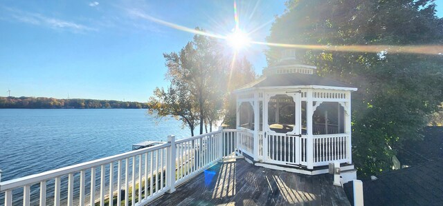 5578 Lake Shore Dr, Weidman, MI 48893 - wooden deck featuring a gazebo and a water view