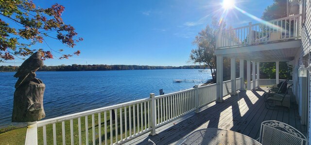 5578 Lake Shore Dr, Weidman, MI 48893 - deck with a water view