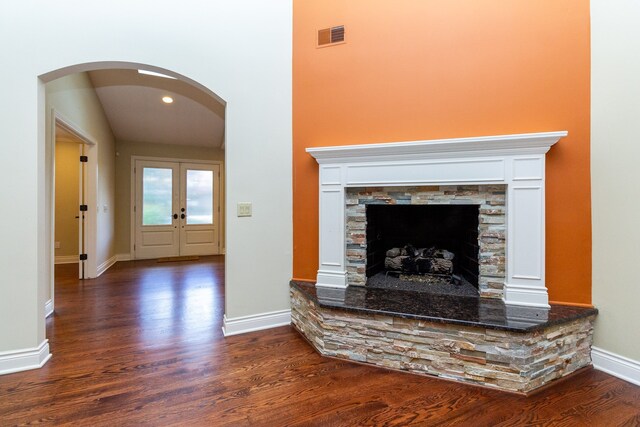 4345 Pine Tree Trl, Bloomfield Hills, MI 48302 - unfurnished living room featuring wood finished floors, arched walkways, baseboards, and french doors