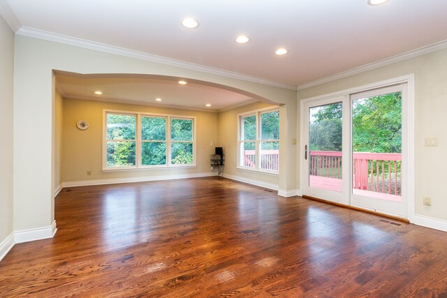4345 Pine Tree Trl, Bloomfield Hills, MI 48302 - spare room with wood finished floors, crown molding, arched walkways, baseboards, and recessed lighting