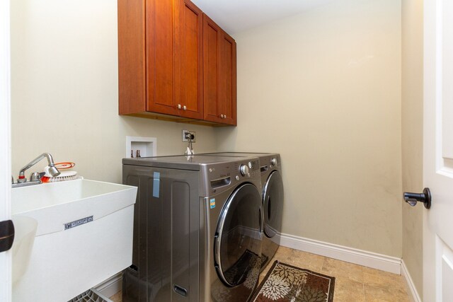 4345 Pine Tree Trl, Bloomfield Hills, MI 48302 - washroom with independent washer and dryer, cabinet space, and baseboards